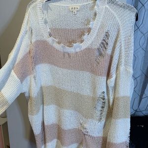 ripped, light sweater